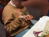 Susan stitching away on her needlecase
