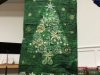 Pat Clark-a green, lighted Christmas tree as a gift for Peg Barnes